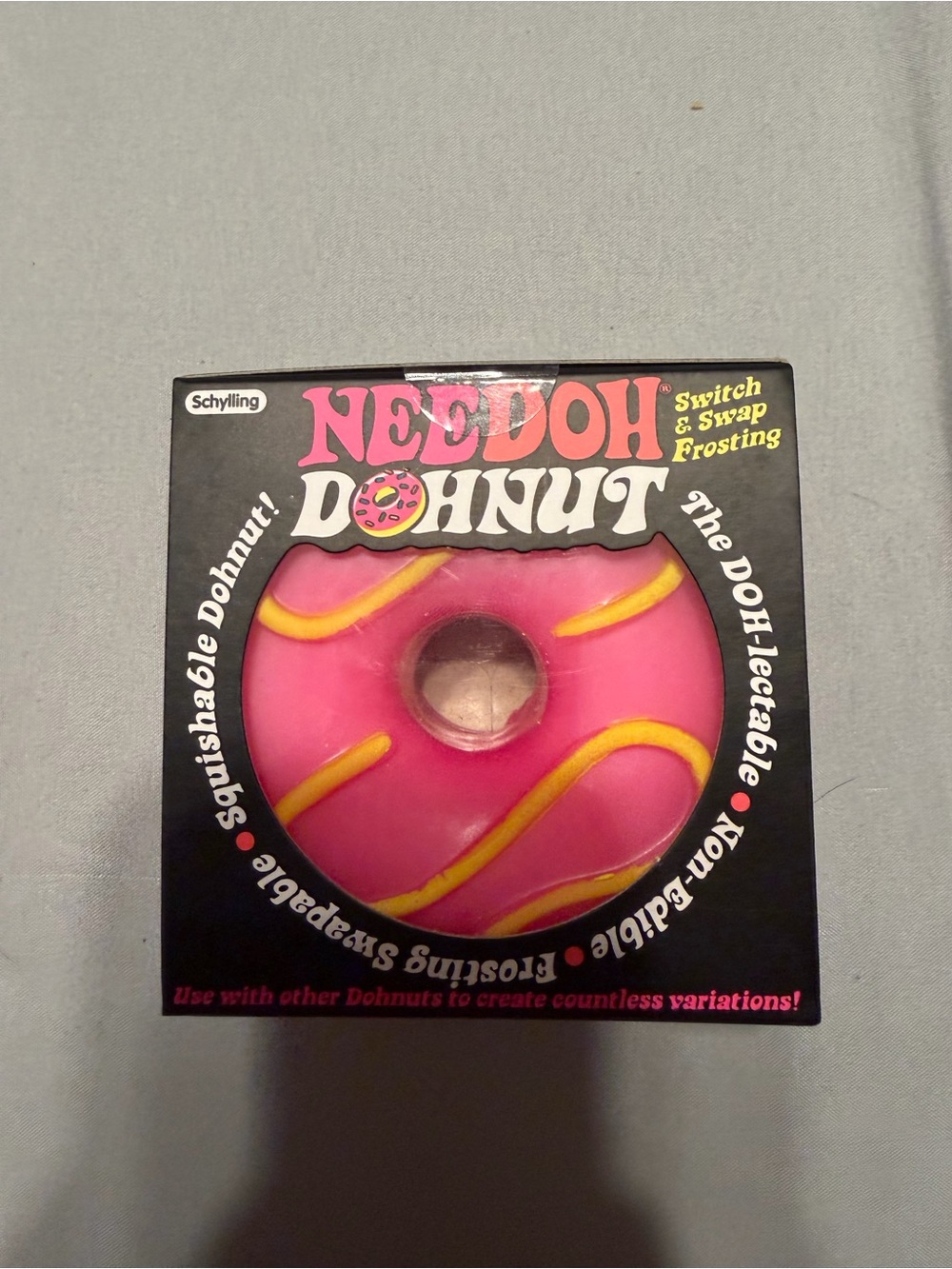Schylling Needoh Donut Pink Play Toy with Yellow Frosting